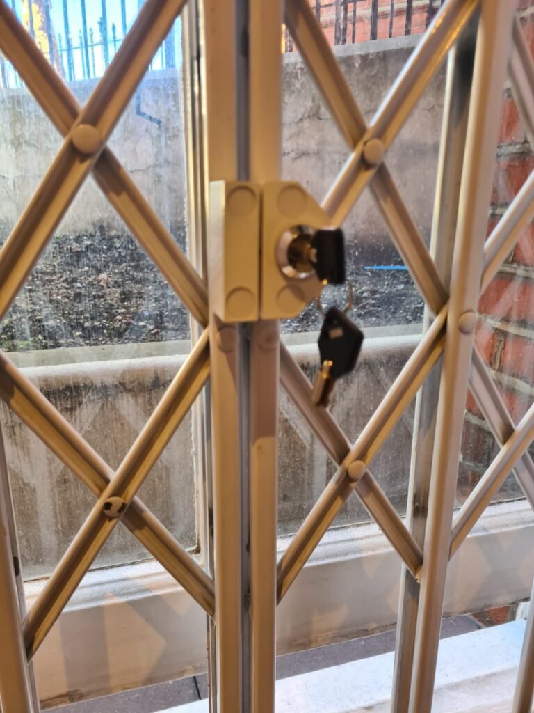 Window locks installation for for your home | window lock changed on a grid window brown colour
