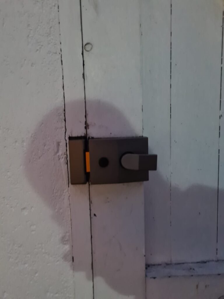 Interesting How much does a locksmith cost UK for a normal wooden door with grey door lock?