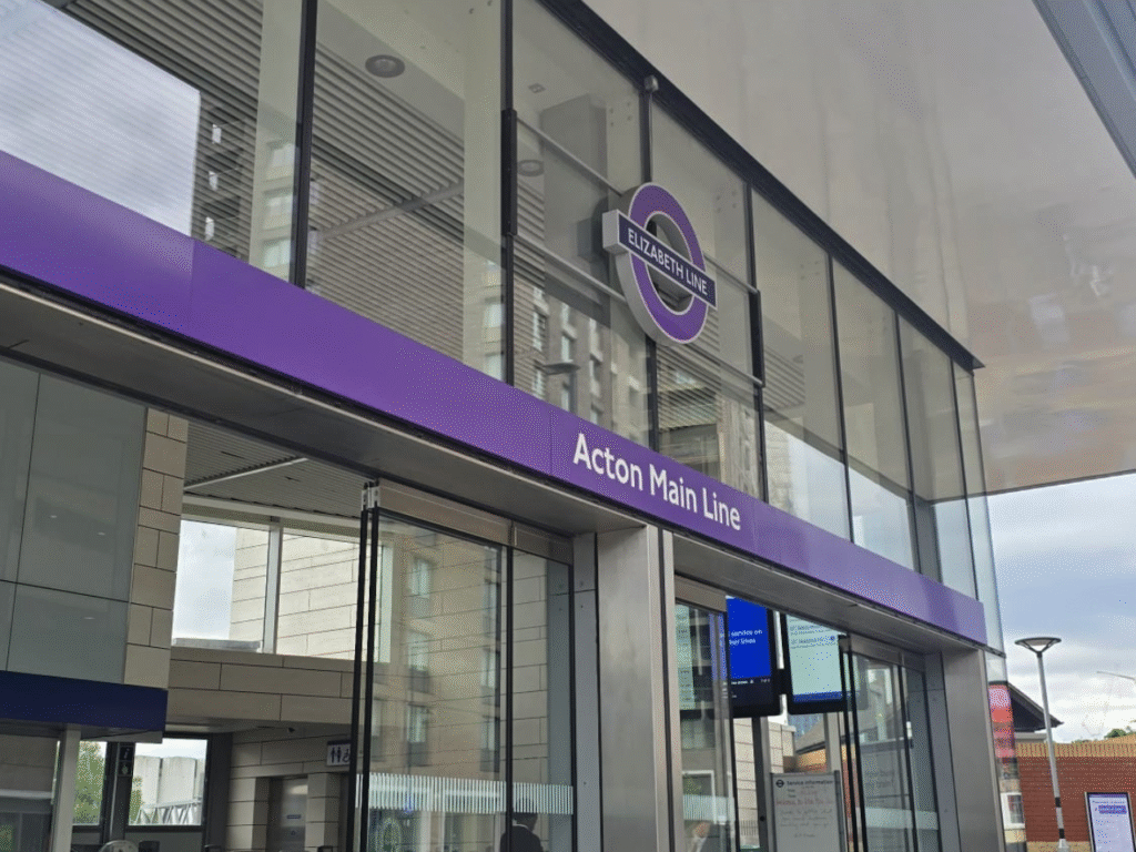 Locksmith Acton W3 | The Acton Main Line tube station Elizabeth line purple written with white characters